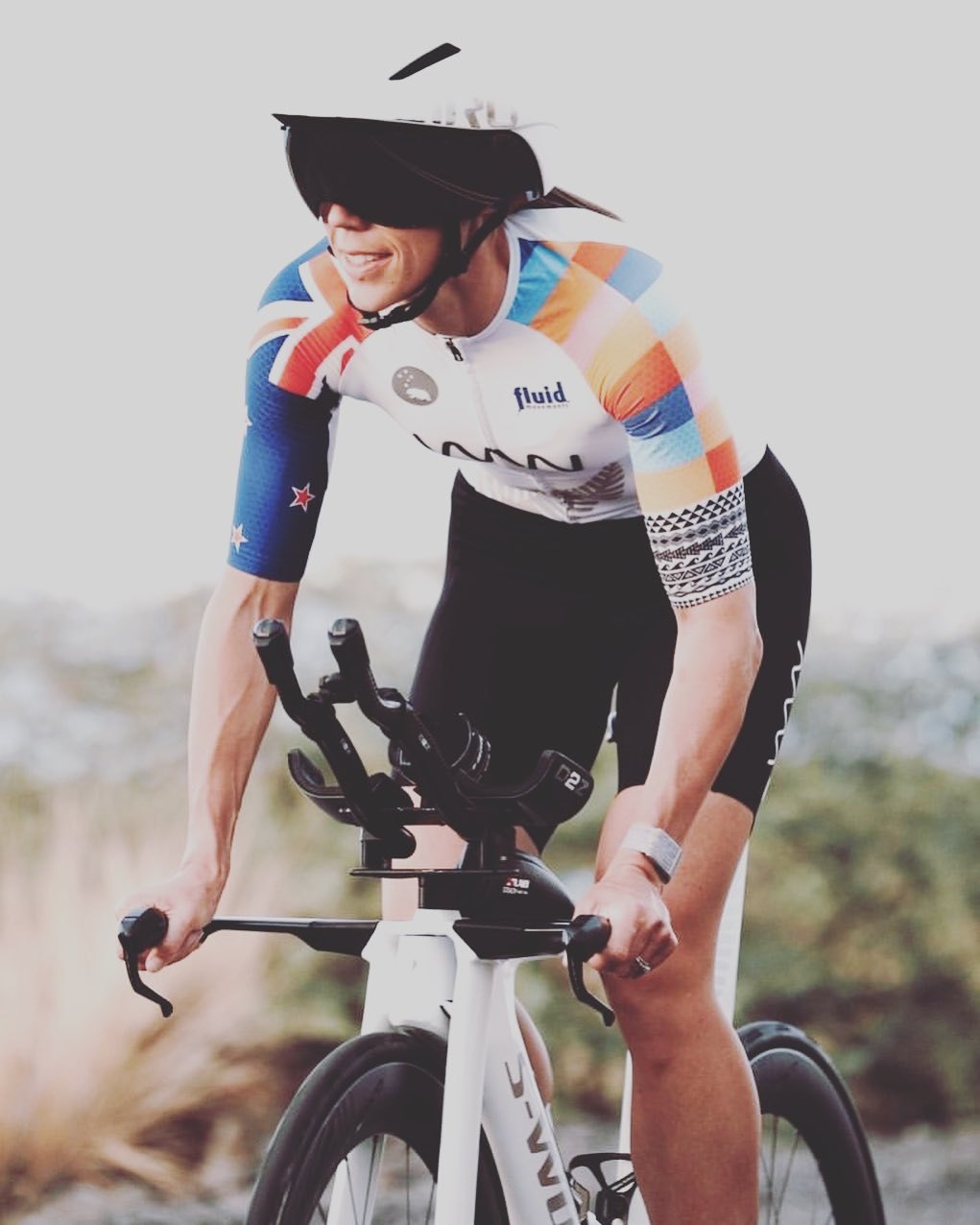 A triathlete client out on the bike